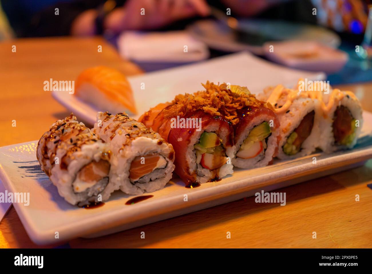 MALAGA, SPAIN - MARCH 10, 2023: Sushi menu in Sakura restaurant in Malaga, Spain on March 10, 2023 Stock Photo