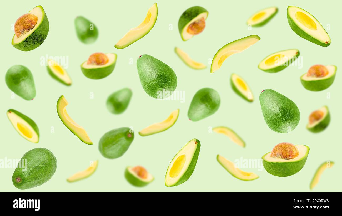Creative levitation pattern with avocado. Selective focus. Isolated ...