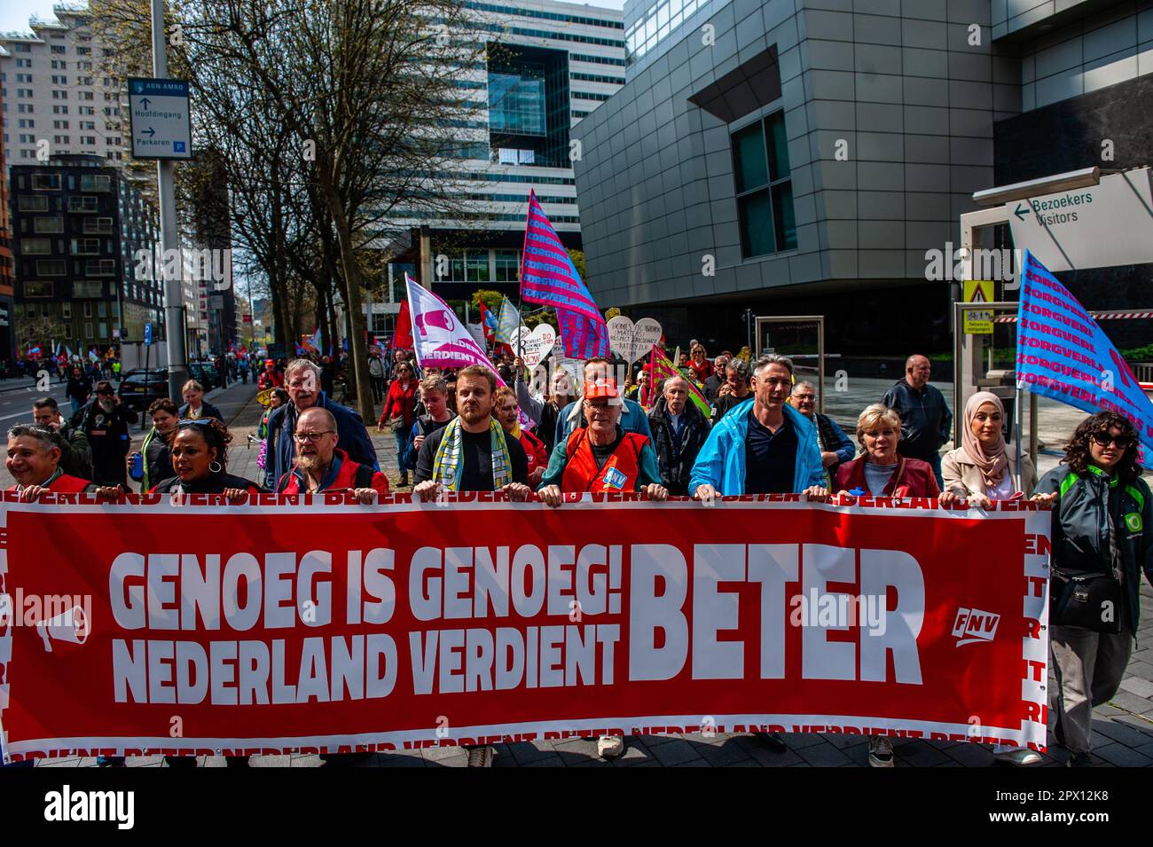 Amsterdam, Netherlands. 01st May, 2023. People are seen walking behind the principal banner. On