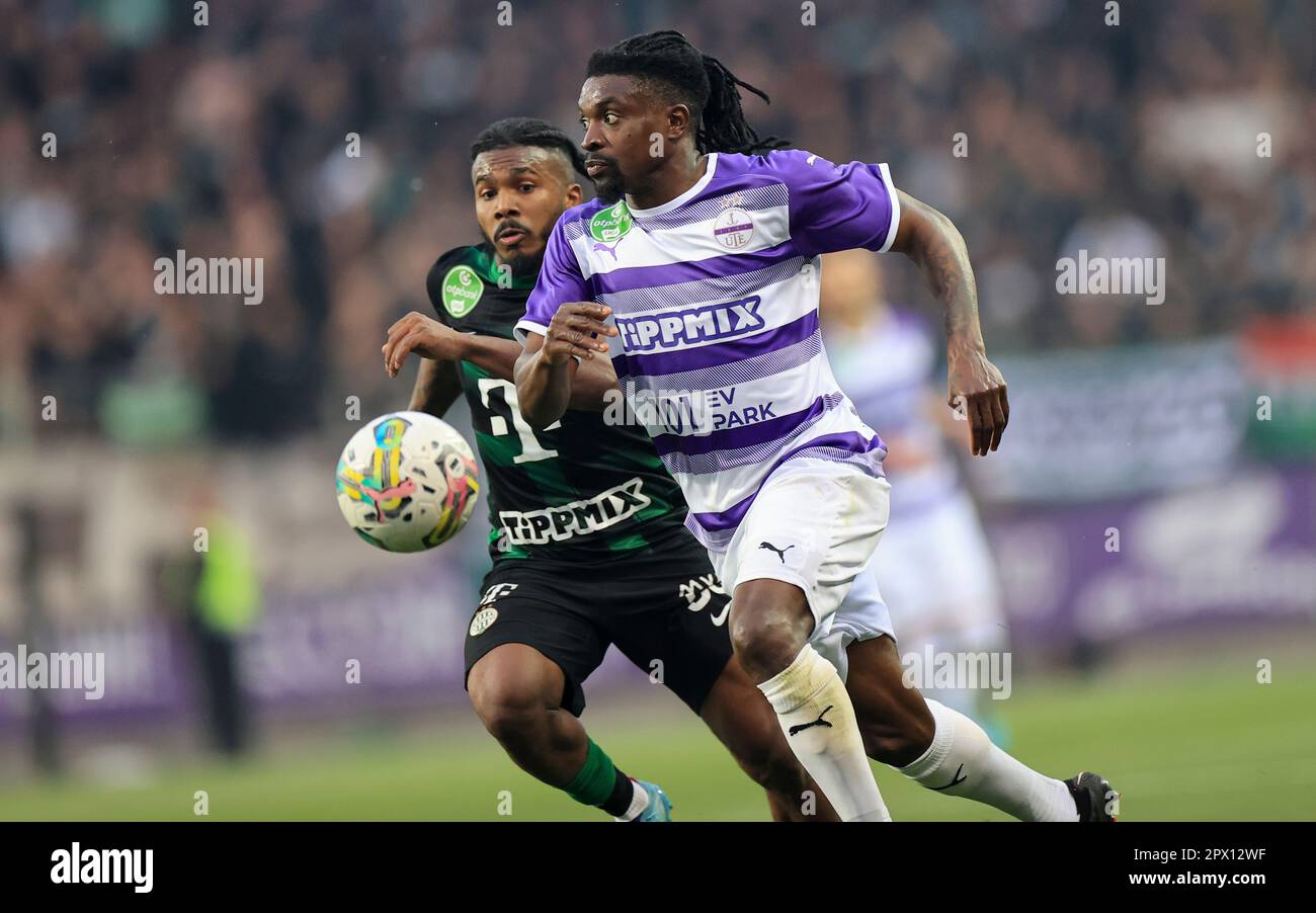 Petrus Boumal of Ujpest FC competes for the ball with Jose Marcos