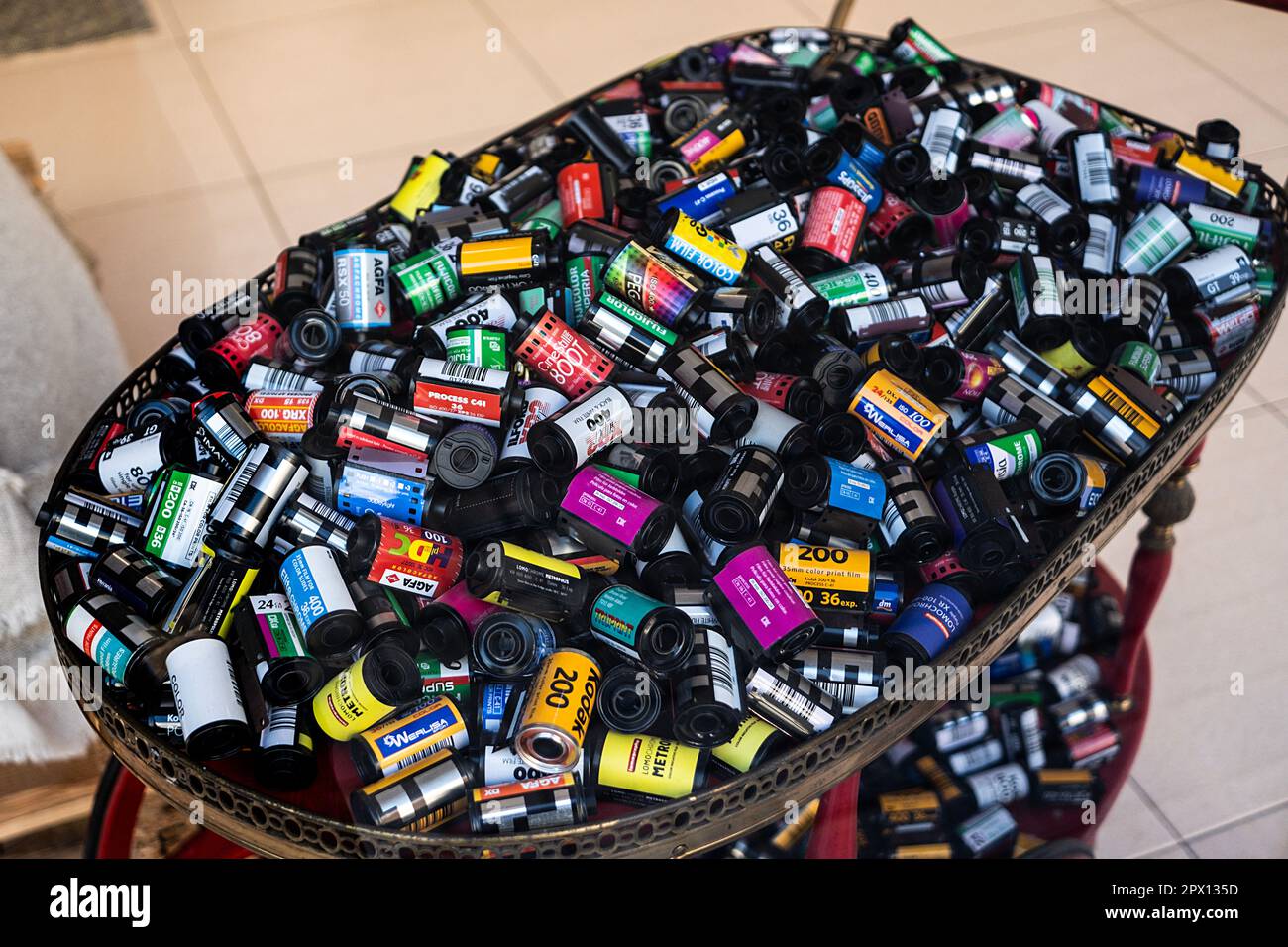 A collection of old camera films on display in a shop in Barcelona
