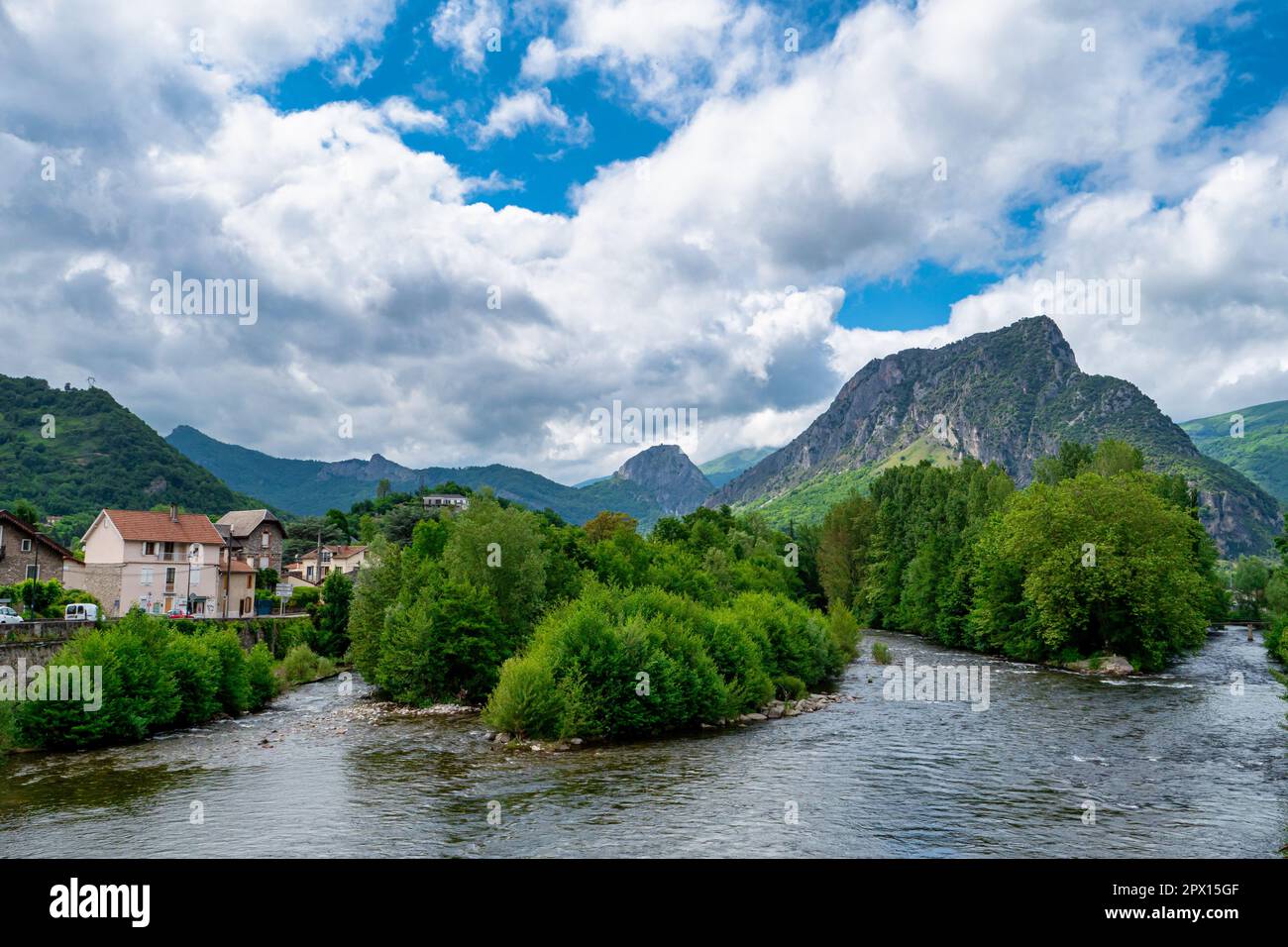view of Overview of river and countryside, Tarascon-sur-Ariege, Ariege, Midi-Pyrenees, Stock Photo