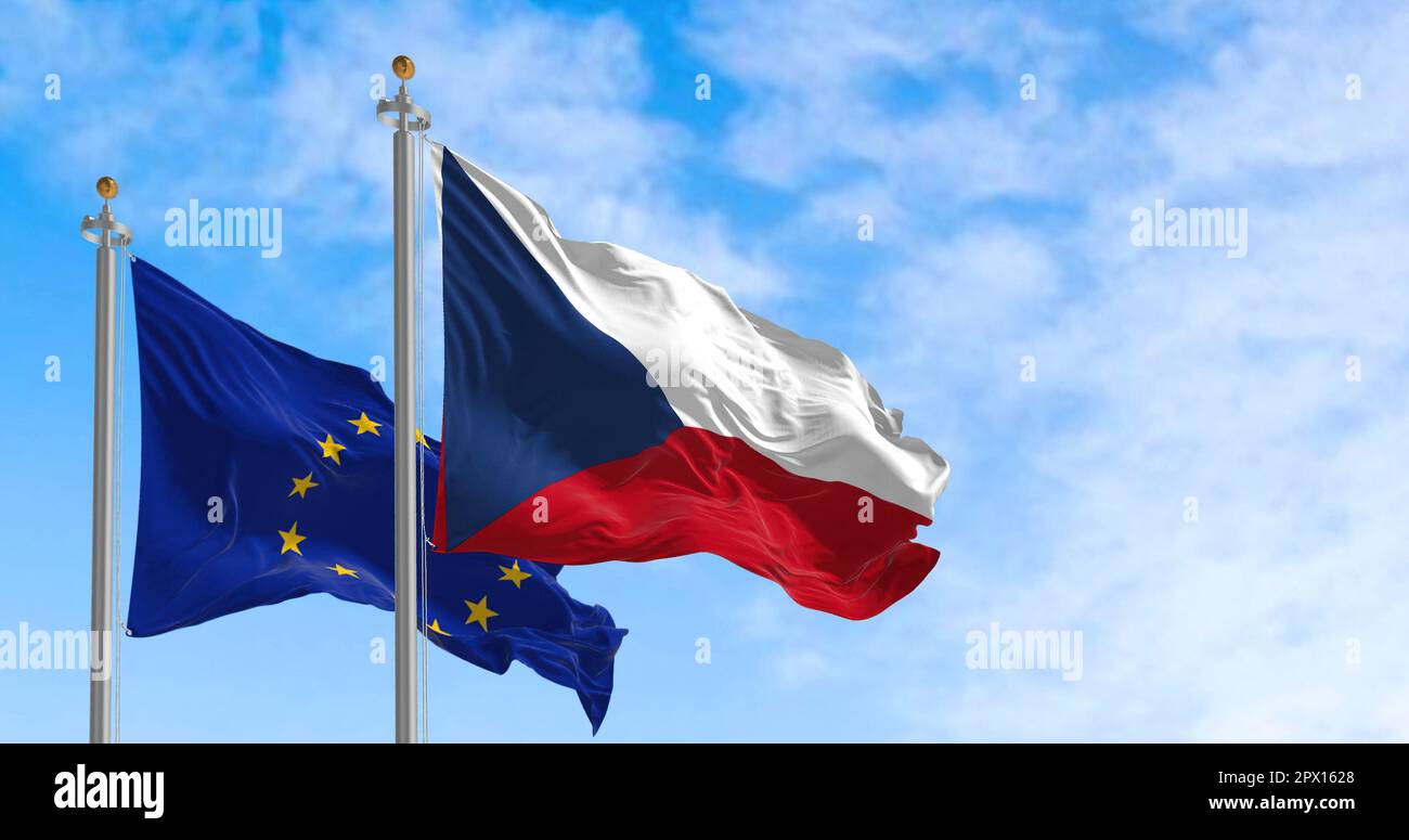 The flags of Czech Republic and the European Union waving together on a clear day. The Czech Republic became a member of the European Union on May 1, Stock Photo