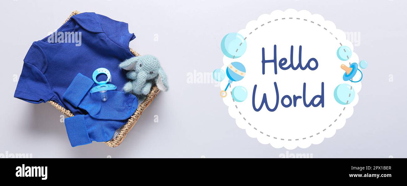 Banner with text HELLO WORLD baby clothes and accessories in box Stock Photo Alamy