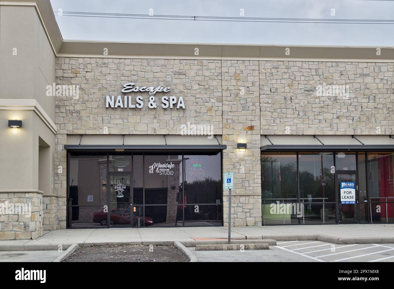 Humble, Texas USA 02-26-2023: Escape Nails and Spa storefront exterior in Humble, TX. Luxury spa and salon local business. Stock Photo
