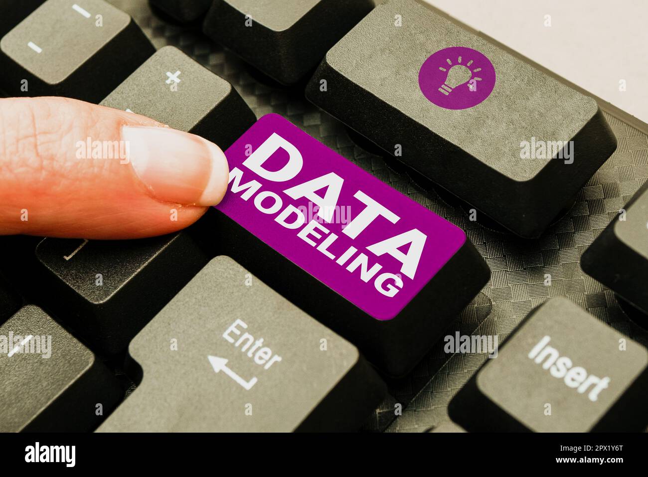 Hand writing sign Data Modeling, Business idea process of transferring data between data storage systems Stock Photo