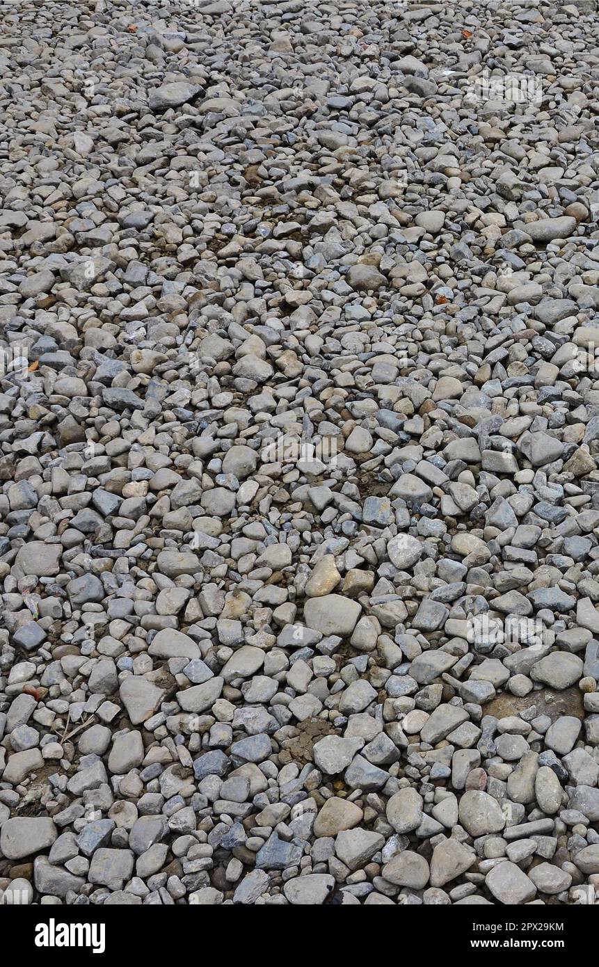 Texture of many crushed stones. Crushed stone is a solid base material