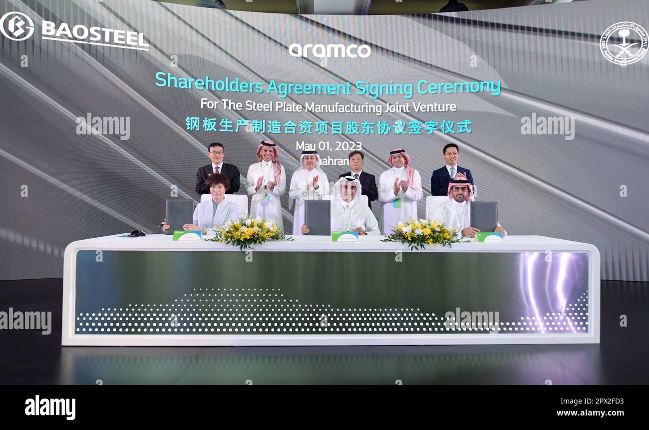 (230501) -- DAMMAM (SAUDI ARABIA), May 1, 2023 (Xinhua) -- Representatives from Saudi Aramco, China's Baoshan Iron & Steel Co., Ltd (Baosteel) and Saudi Public Investment Fund (PIF) attend a signing ceremony in Dammam, Saudi Arabia, on May 1, 2023. Saudi Aramco, China's Baoshan Iron & Steel Co., Ltd (Baosteel), and Saudi Public Investment Fund (PIF) on Monday signed a shareholders' agreement to establish an integrated steel plate manufacturing complex in Saudi Arabia. (Aramco/Handout via Xinhua) Stock Photo