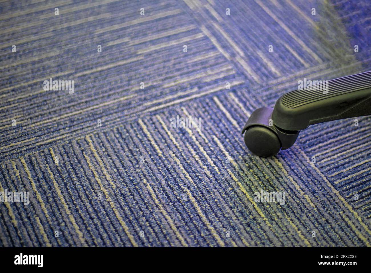 Small black rubber wheels on the carpet Stock Photo Alamy