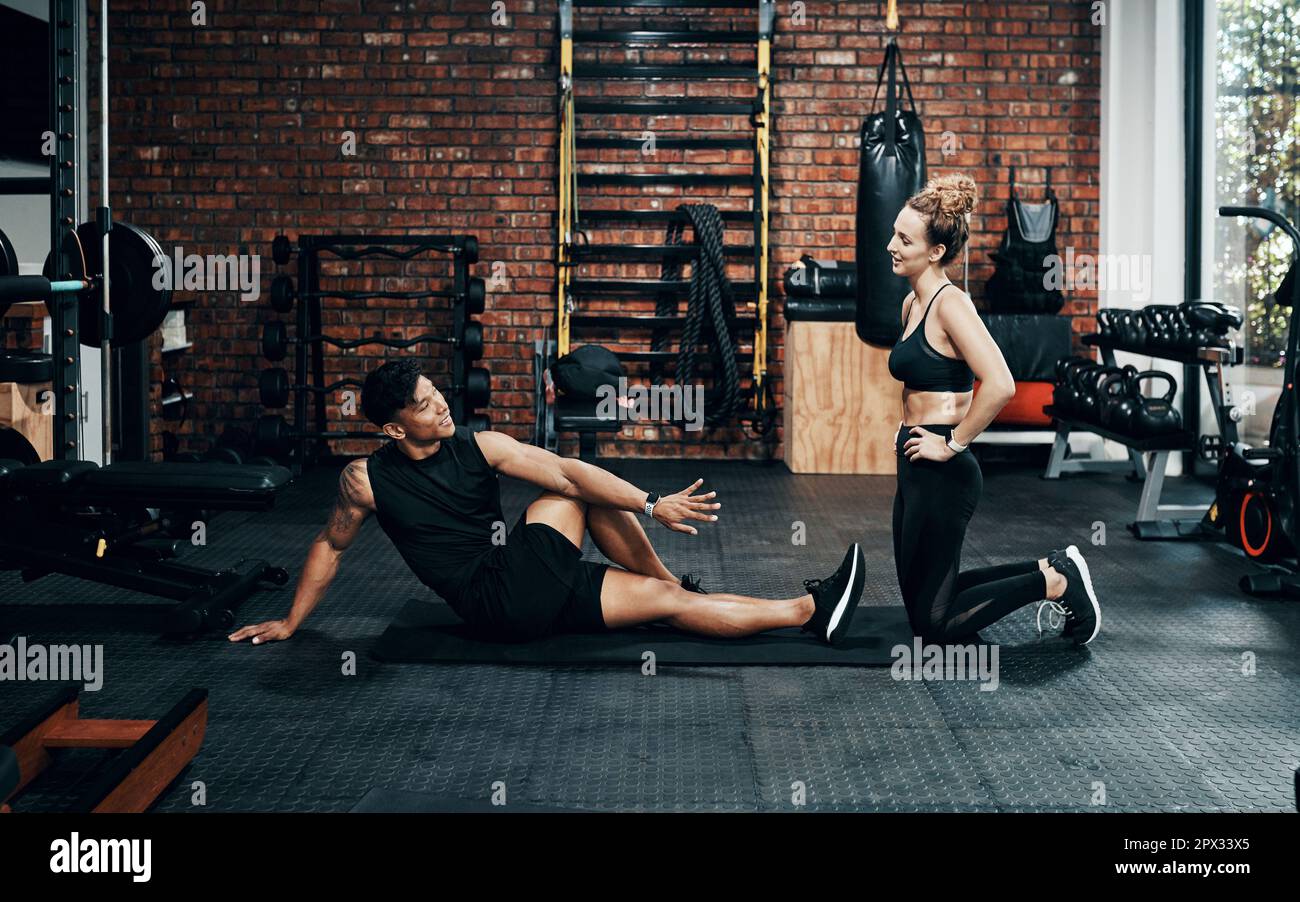 Lets take a quick break before continuing. two sporty young people working out together at the