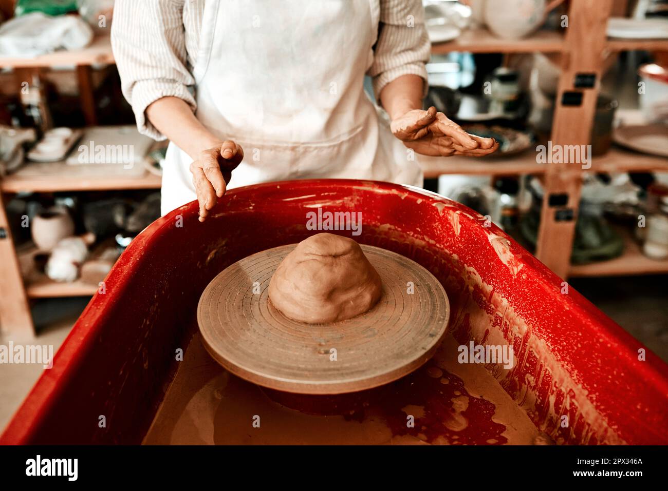 Stylish pottery molding a vase of clay on a potters wheel. Handmade. Stock  Photo by ©Stop war in Ukraine! 421497760