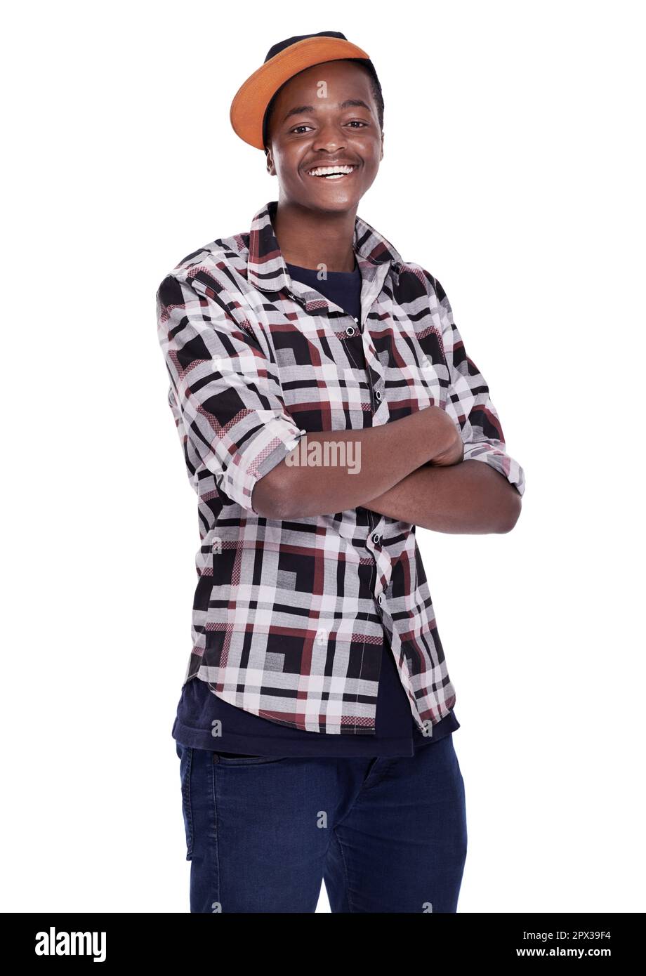 Keeping things trendy and fun. A laughing young african guy standing against a white background. Stock Photo