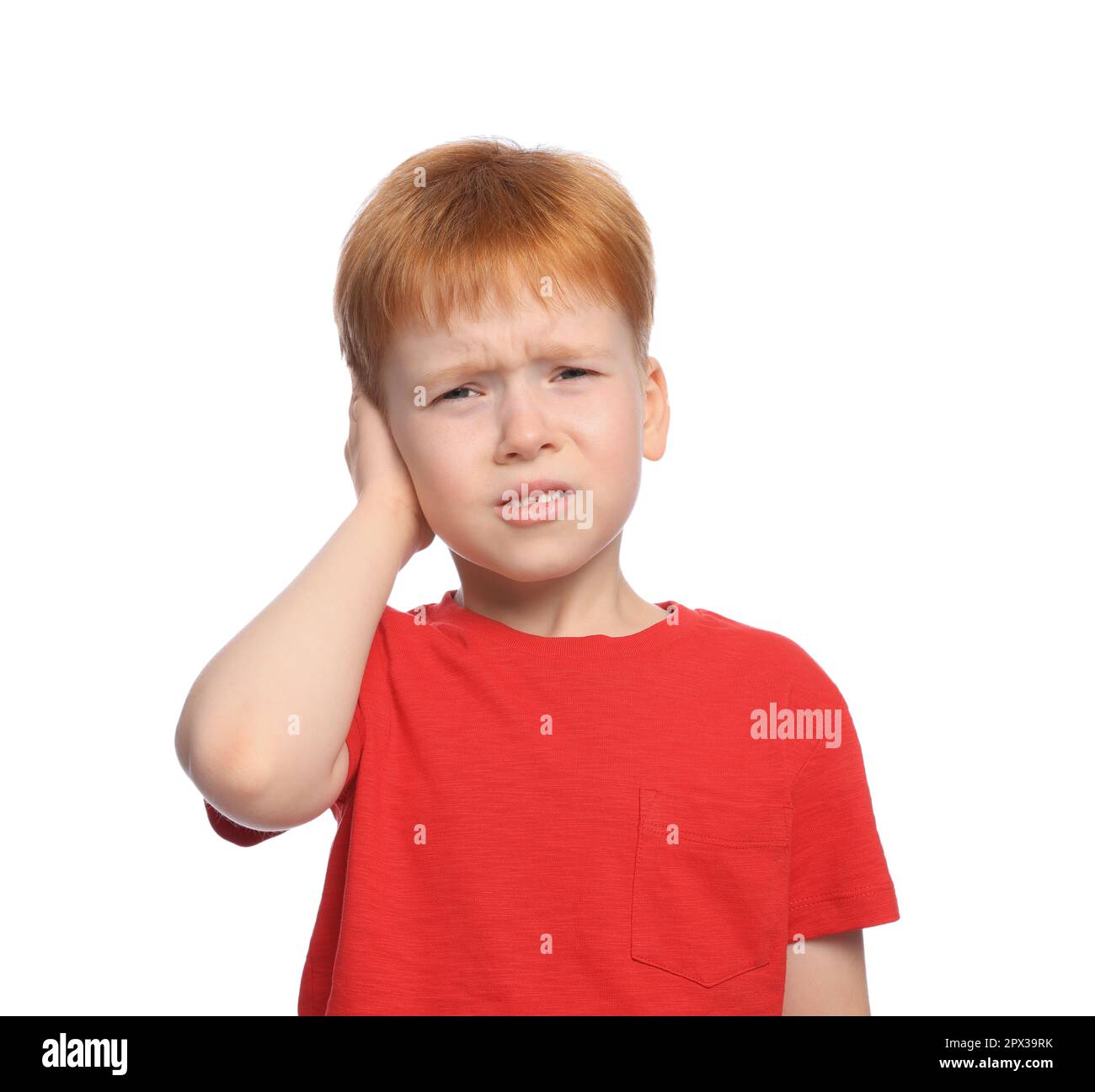 Little boy suffering from ear pain on white background Stock Photo Alamy