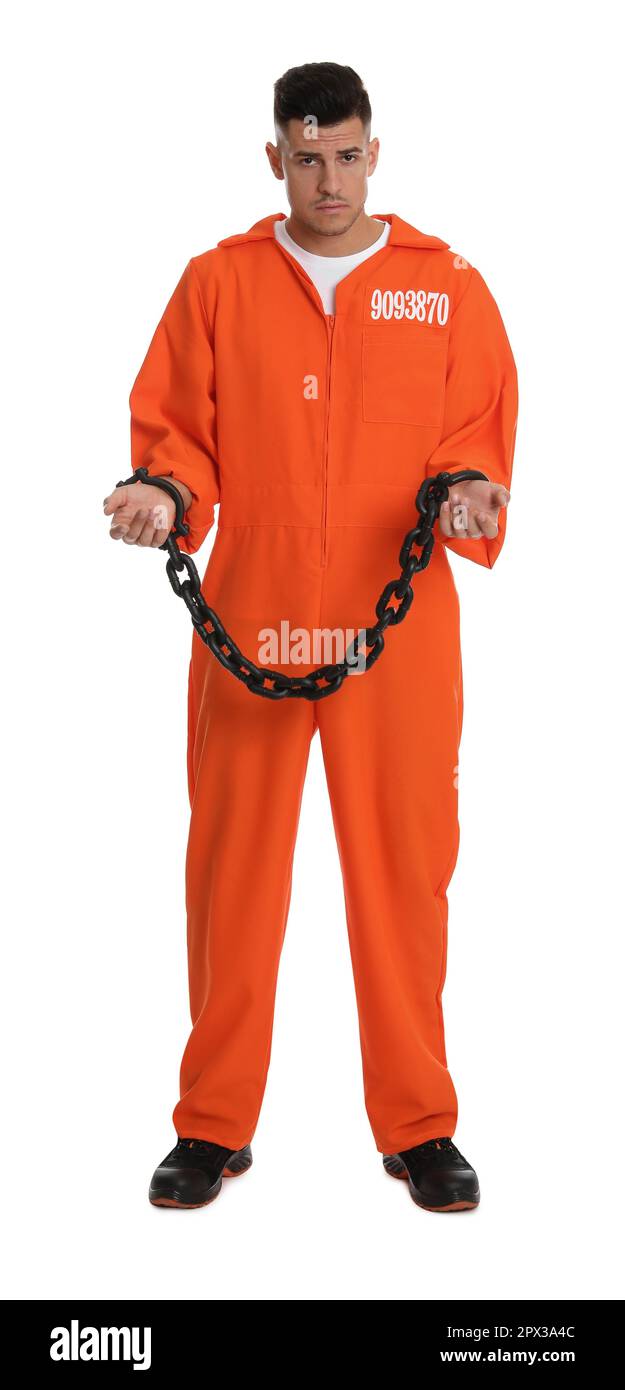 Prisoner in orange jumpsuit with chained hands on white background Stock Photo