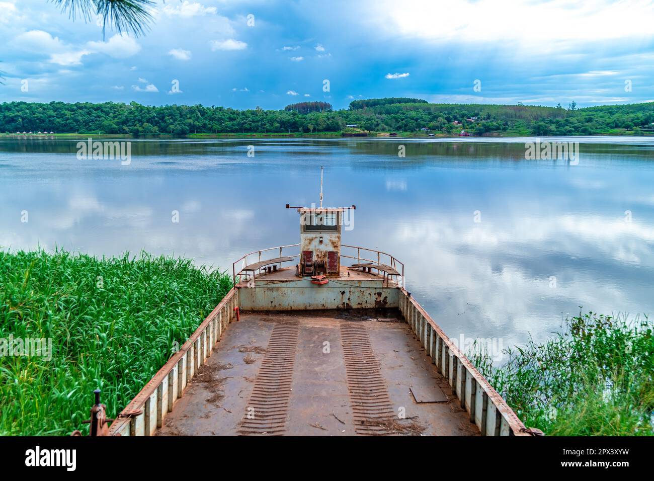 rusty cargo ship by the river Stock Photo - Alamy