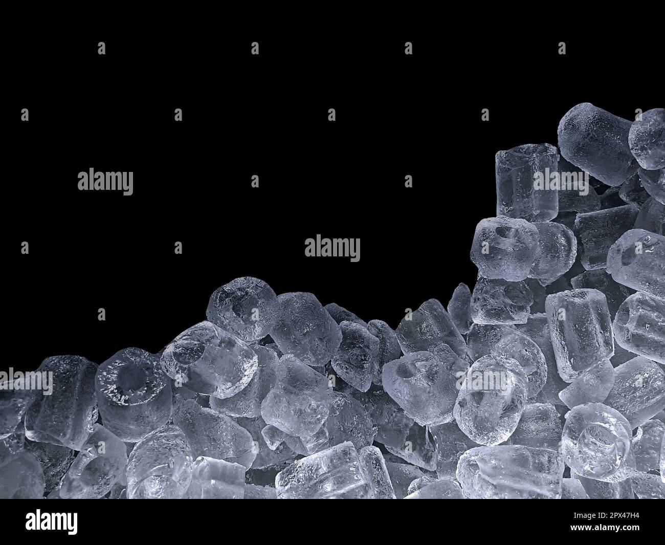 Pieces of crushed ice cubes on black background Stock Photo - Alamy