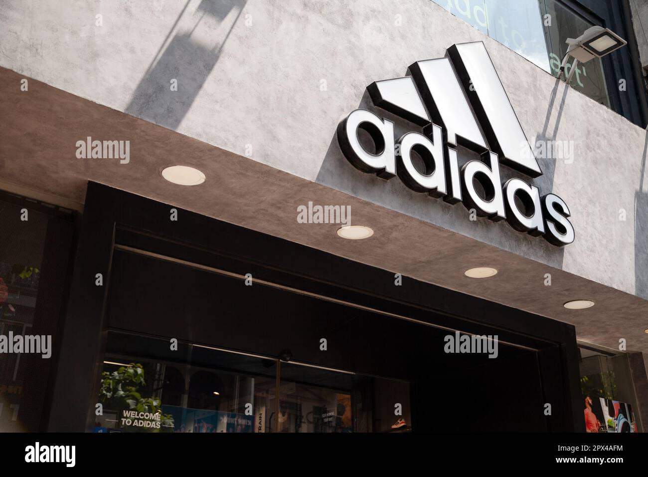 Adidas store logo hi-res stock photography and images - Alamy