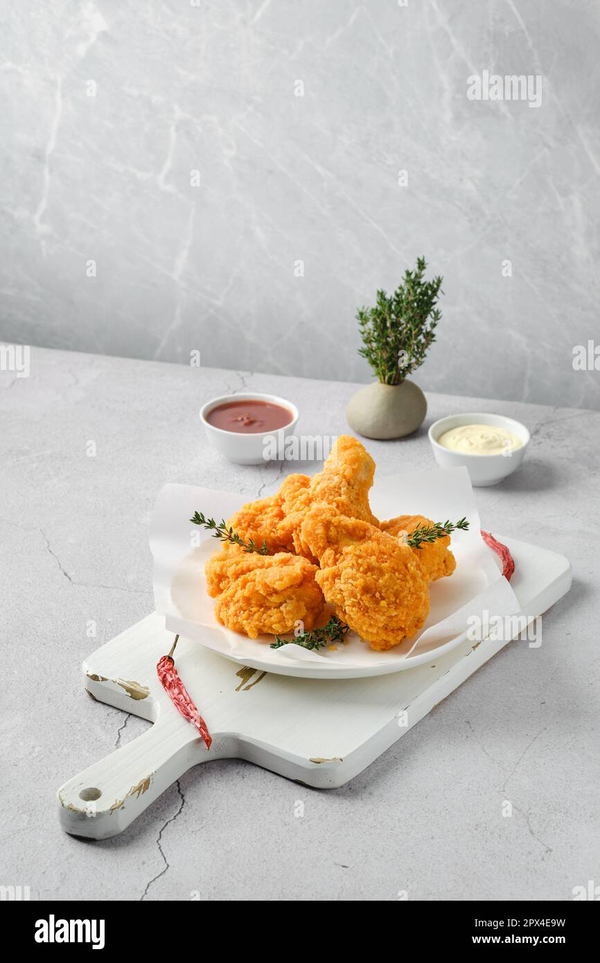 Deep fried chicken in breading on a plate Stock Photo Alamy
