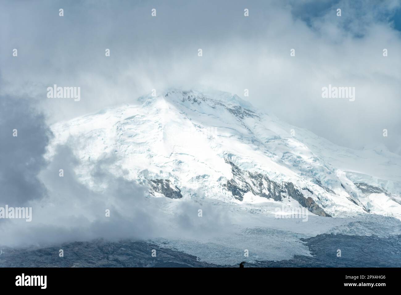 the highest mountain of Peru Huascaran in the Cordillera Blanca mountain range in the Yungay province. Stock Photo