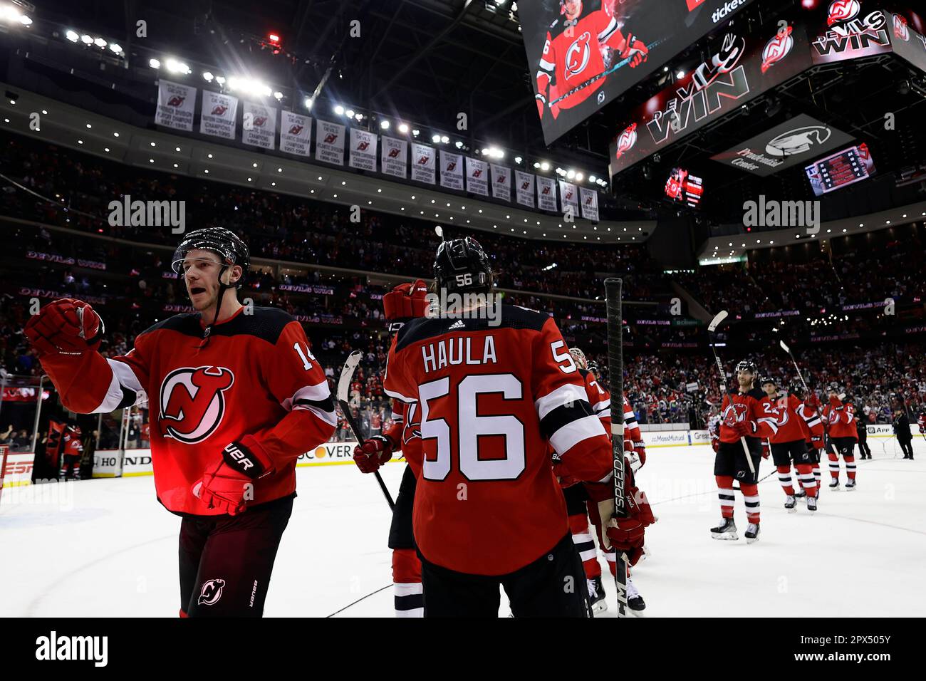 New Jersey Devils left wing Erik Haula (56) celebrates with teammates
