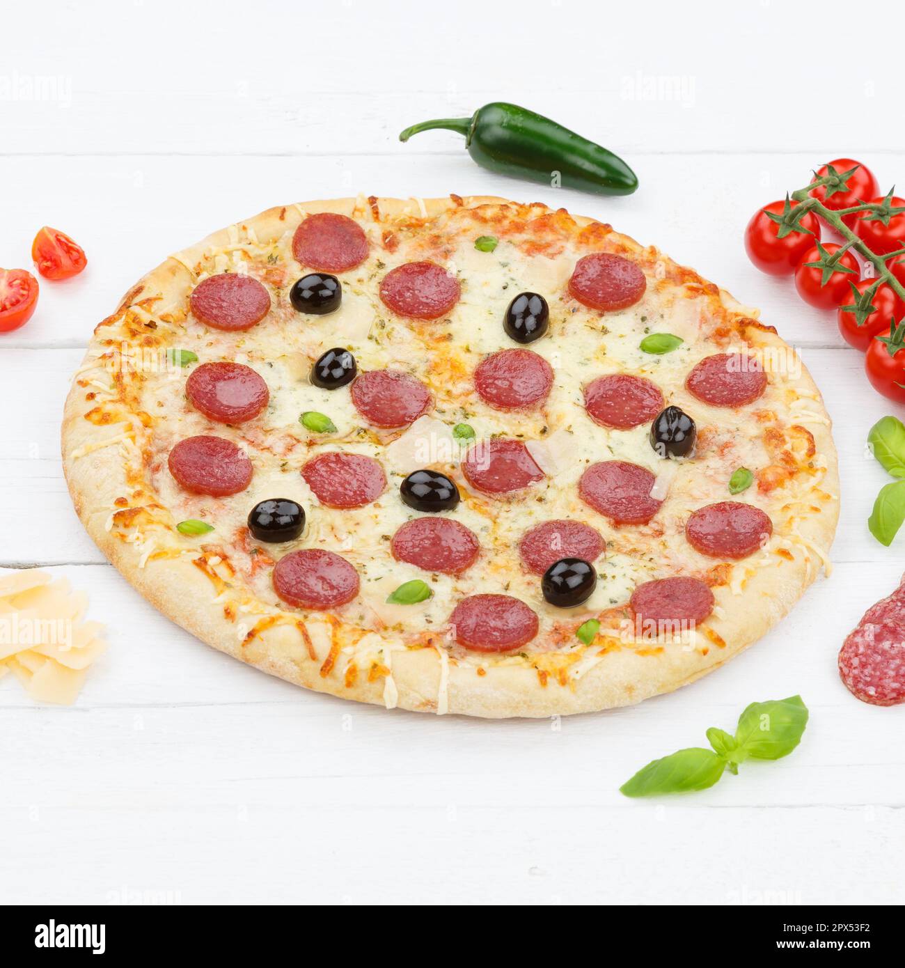 Salami pizza square ingredients on wooden board wood Stock Photo