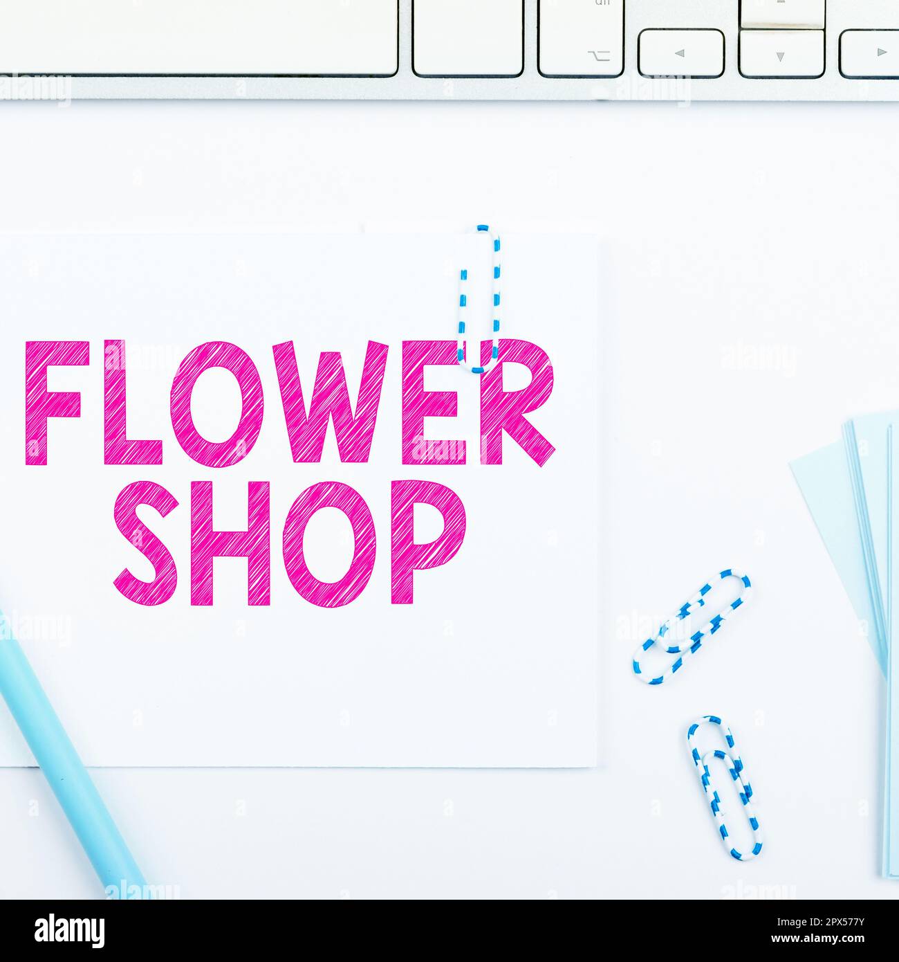 Sign displaying Flower Shop, Word for where cut flowers are sold with decorations for gifts Stock Photo