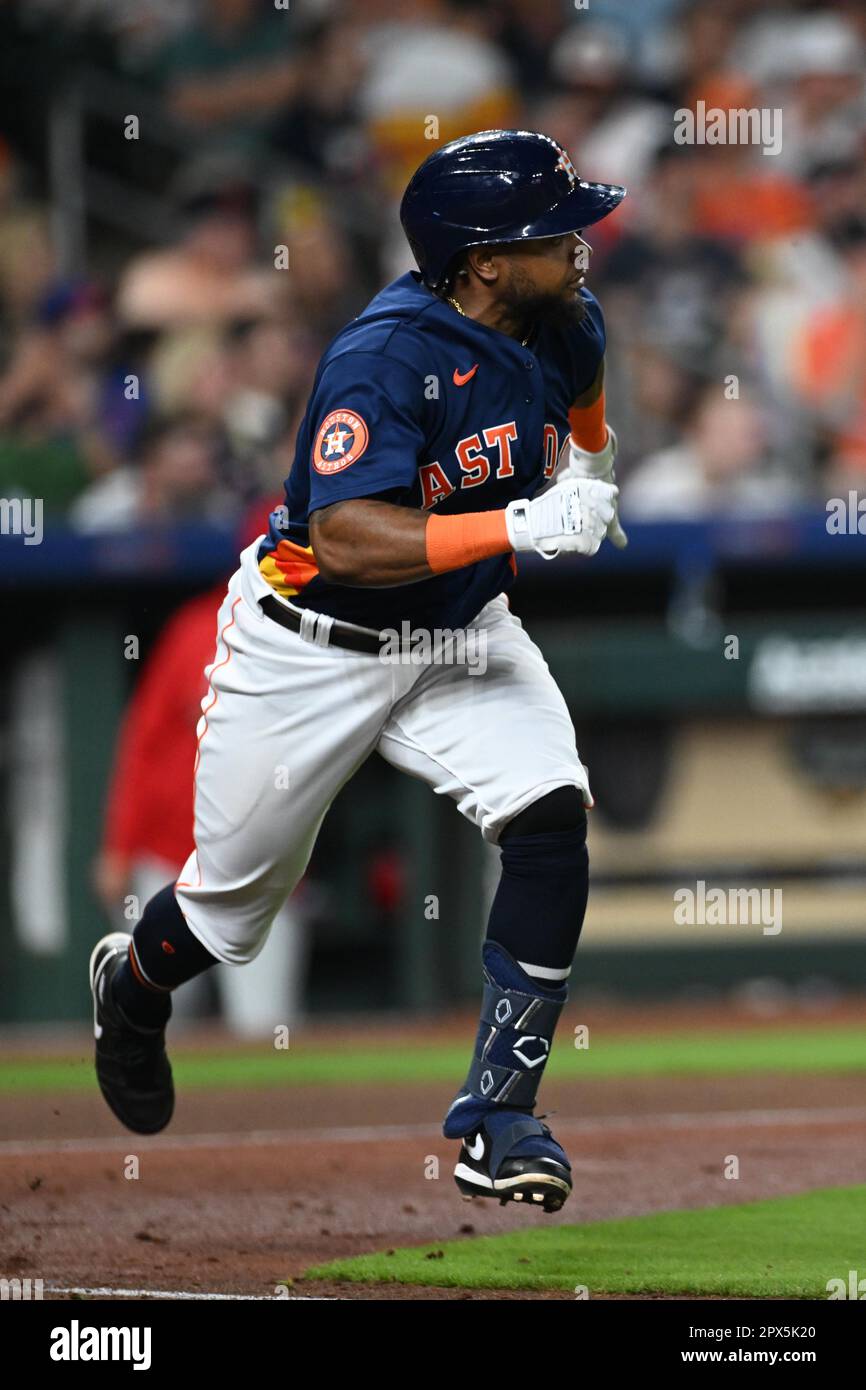 Houston Astros right fielder Corey Julks (9) reaches first base on an infield single in the bottom of the fifth inning during the MLB game between the Stock Photo