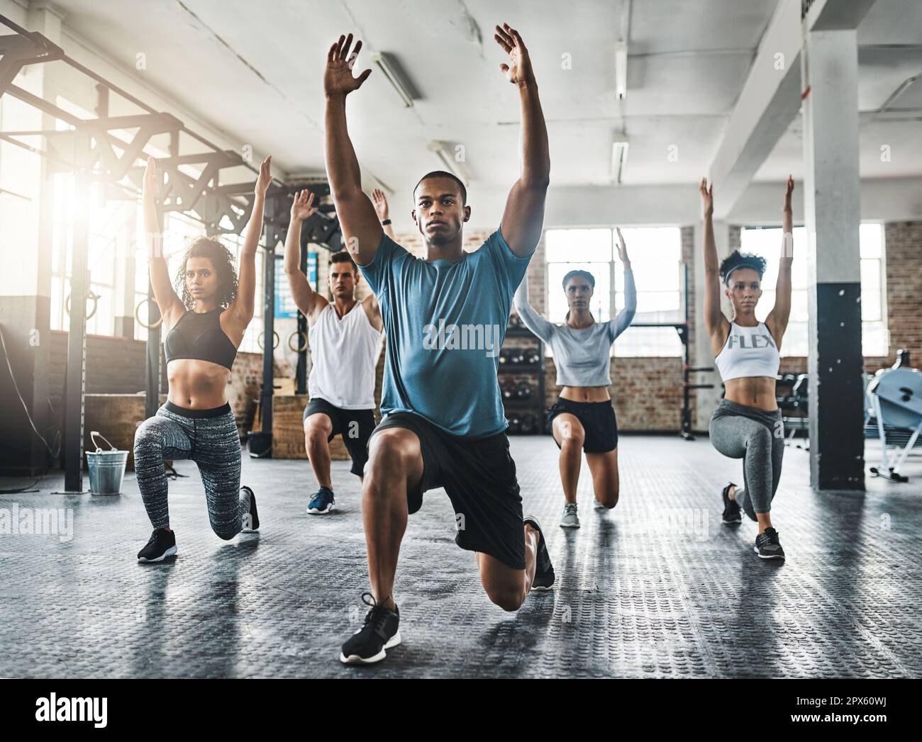 Group during stretching in gym hi-res stock photography and images - Alamy