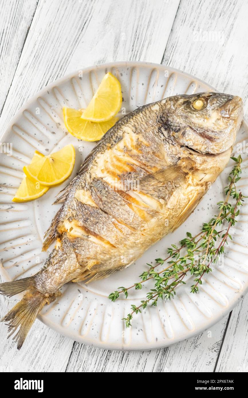Mediterranean Baked Sea Bream Dorada fish with thyme Stock Photo - Alamy