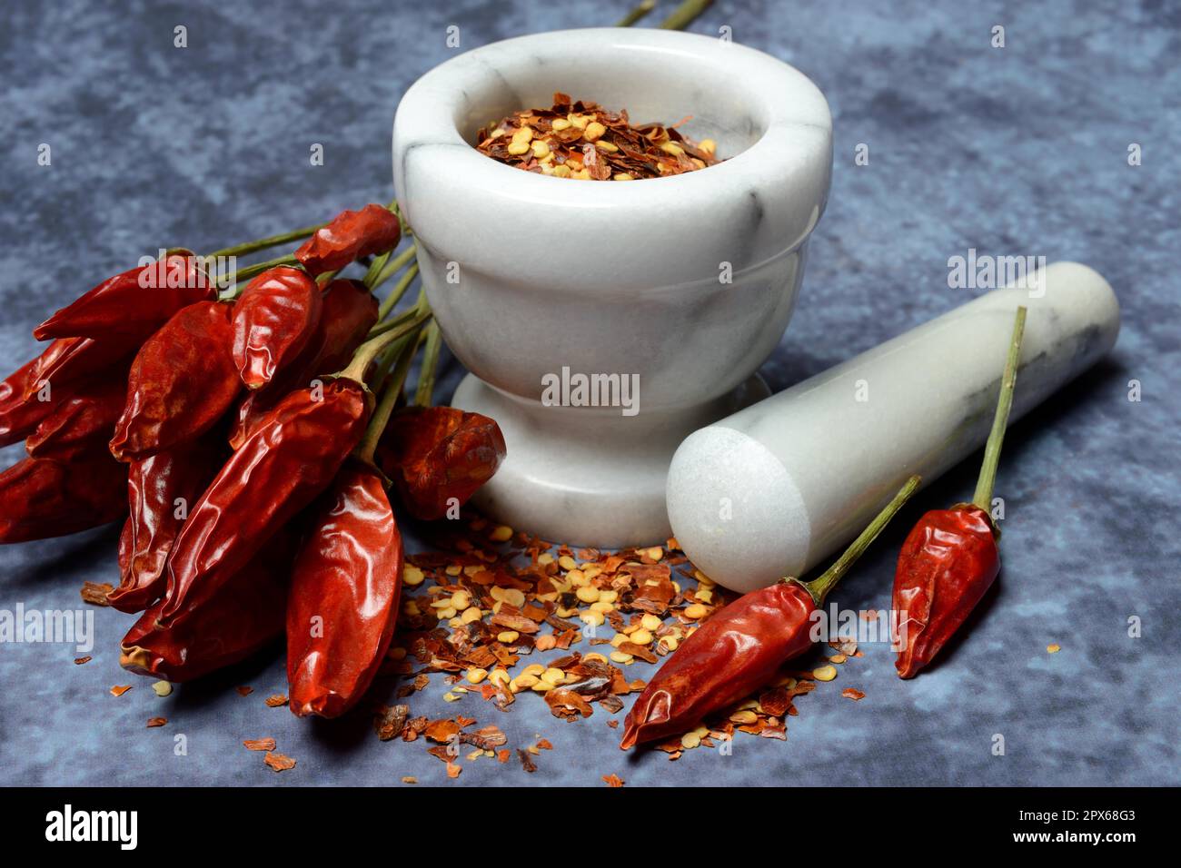 Chilli, dried chilli peppers (Capsicum) and chilli flakes annuum Stock Photo