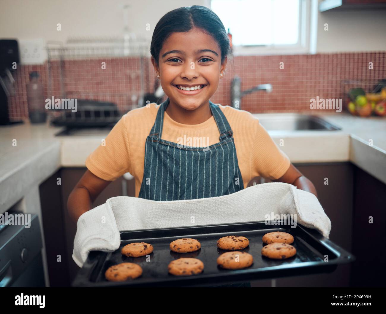 Girl kid, cookies and baking with portrait and bakery skill, learning and  development with success and pride. Cookie, dessert and proud child baker  co Stock Photo - Alamy
