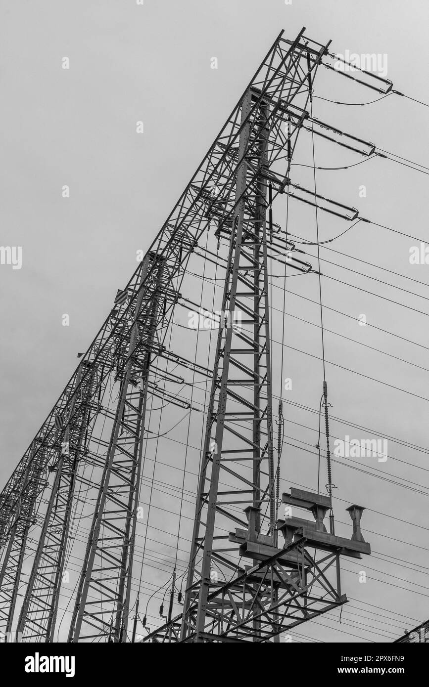 Electricity transmission lines in monochrome at sunset Stock Photo Alamy