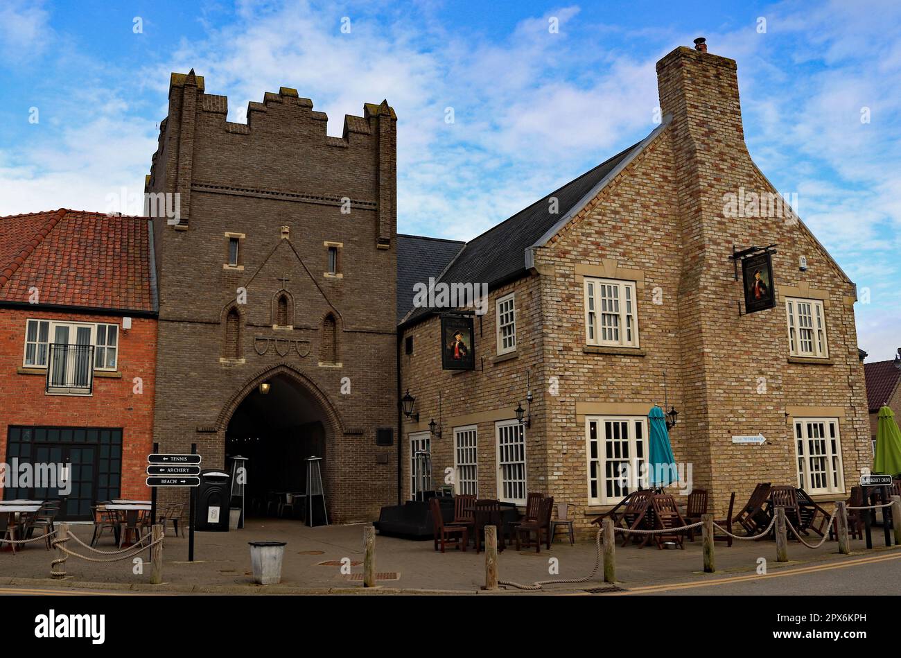 The faux castle frontage and the John Paul Jones pub on the Bay Holiday Park built on the former Butlins holiday camp near Filey in North Yorkshire. Stock Photo