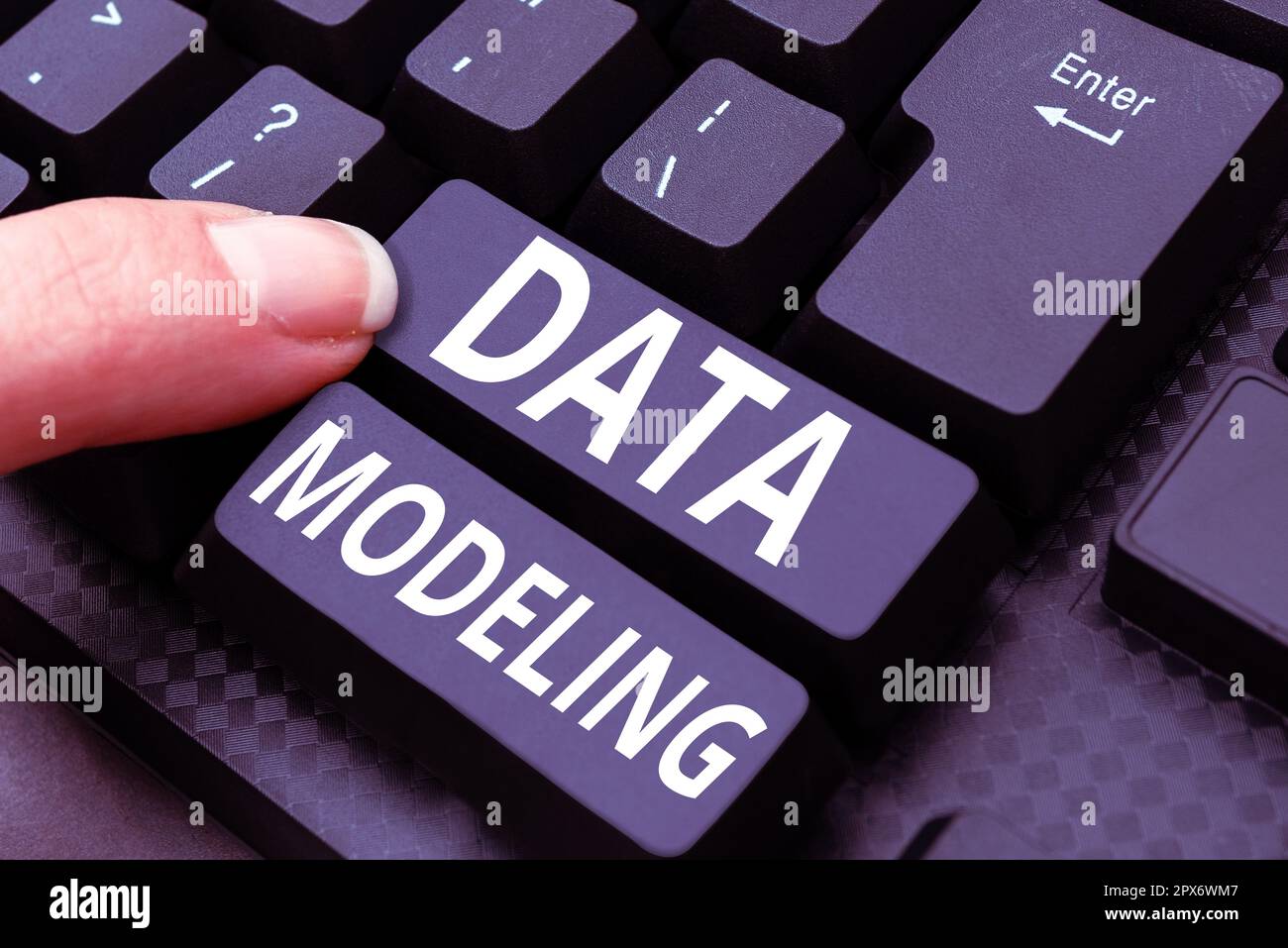 Hand writing sign Data Modeling, Business concept process of transferring data between data storage systems Stock Photo