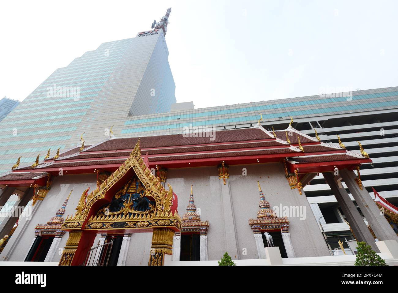 The modern CAT tower with a traditional Thai temple building. Bangkok