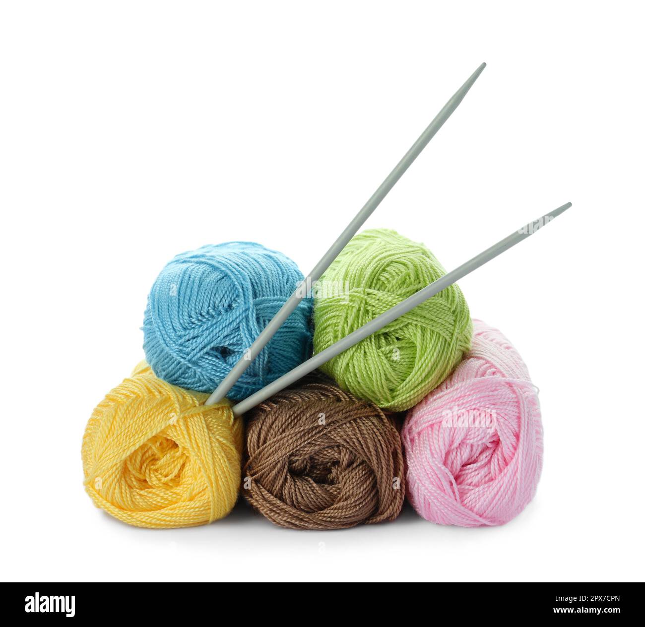 Soft woolen yarns and knitting needles on white background Stock Photo ...