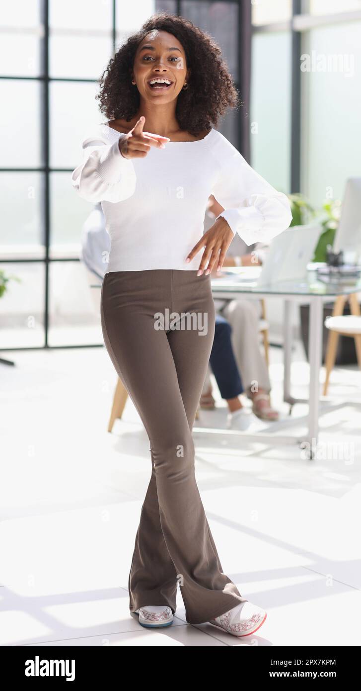 Portrait of a young attractive African American woman in the office ...