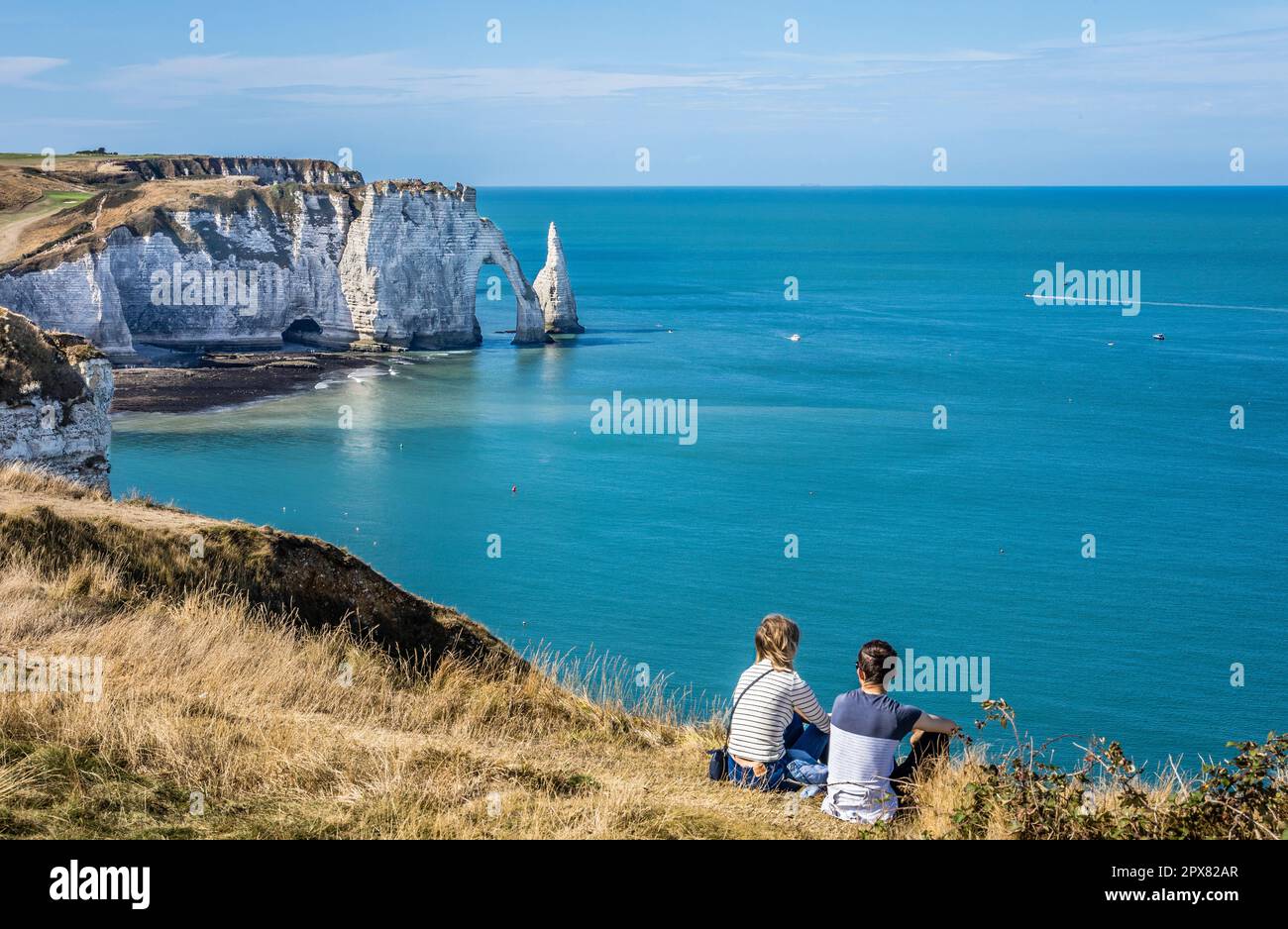 the 70m-high chalk cliff of Falaise d'Aval at Étretat on the Côte d'Albâtre (Alabaster Coast) with  the natural arch of Porte d'Aval and the prominent Stock Photo