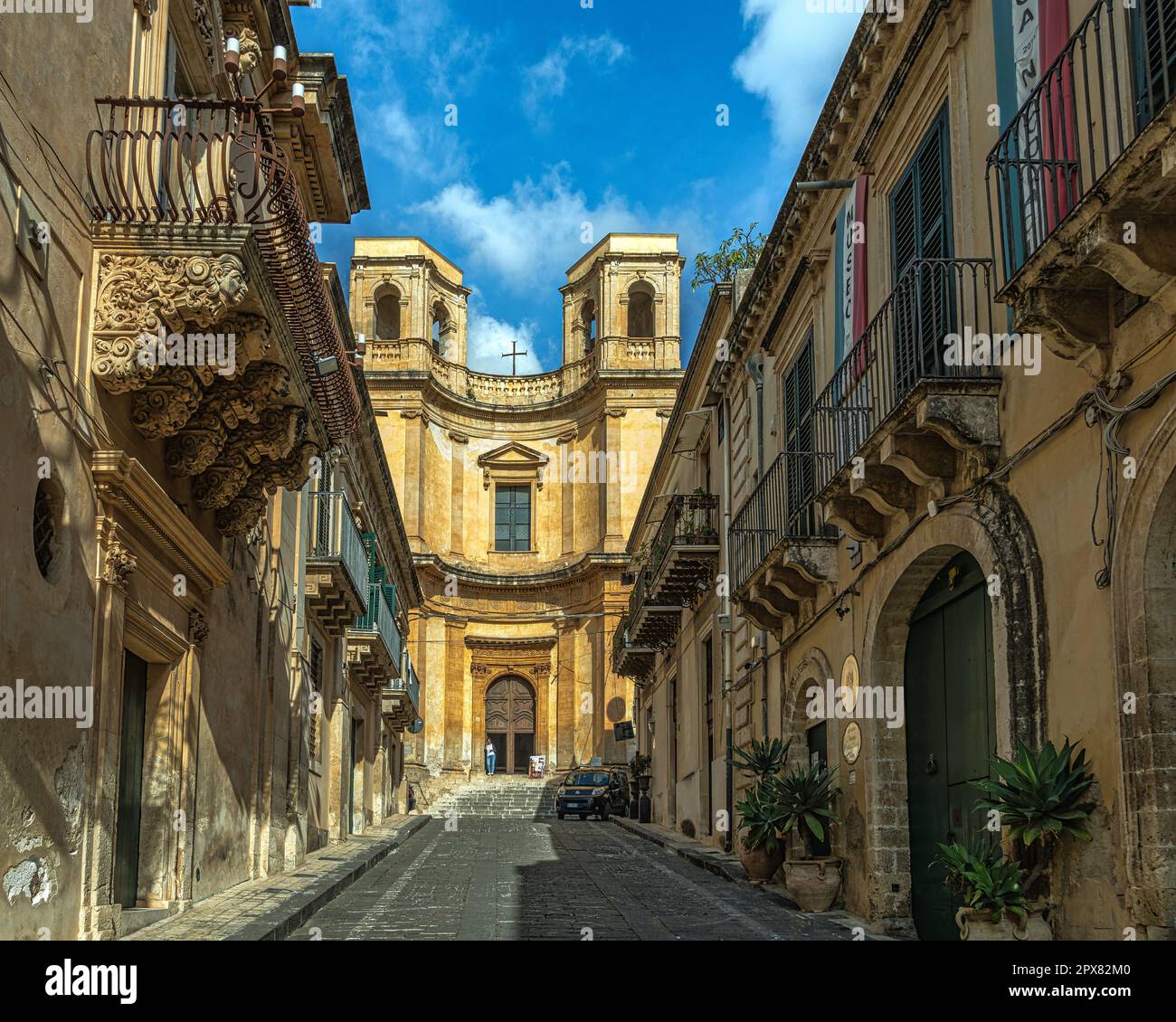 The Church of Montevergini is built at the top of Via Nicolaci and is characterized by the concave facade with two lateral bell towers. Noto, Sicily Stock Photo