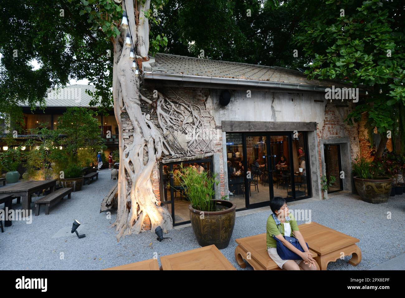 The backyard garden of the Hong Sieng Kong restaurant and bar in Bangkok, Thailand. Stock Photo