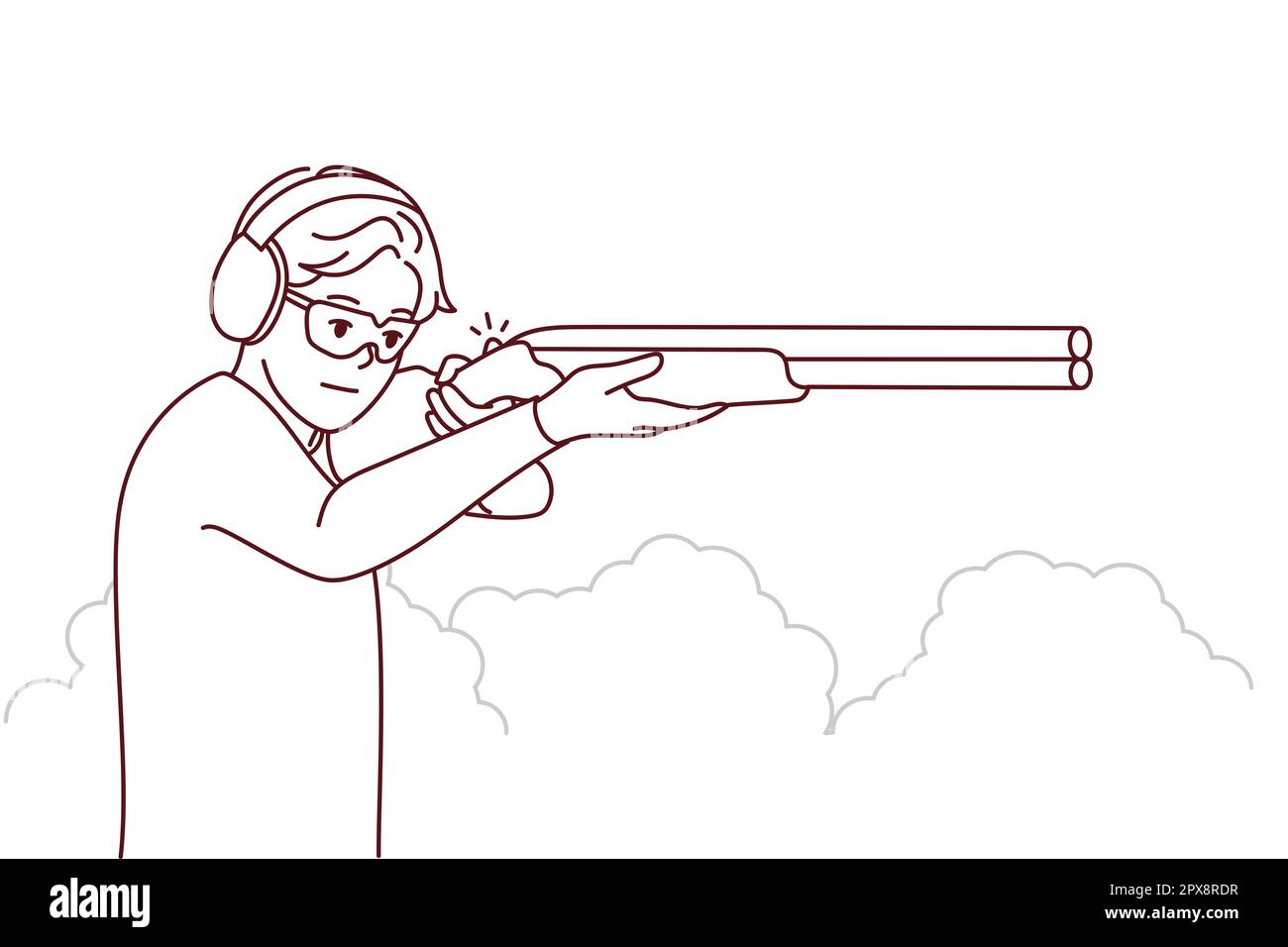 Man in headphones and glasses shoot with rifle in shooting gallery. Guy
