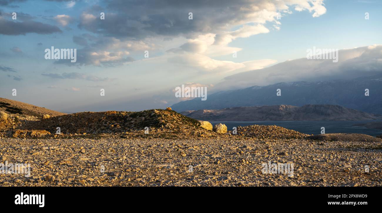 Gravel parking at a viewpoint overlooking mountain peaks Stock Photo ...