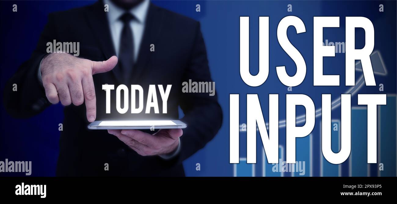 Writing displaying text User Input, Word Written on Any information or data that is sent to a computer for processing Stock Photo