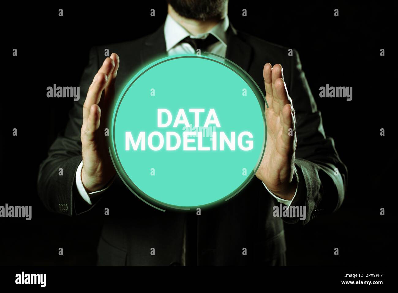 Hand writing sign Data Modeling, Business concept process of transferring data between data storage systems Stock Photo