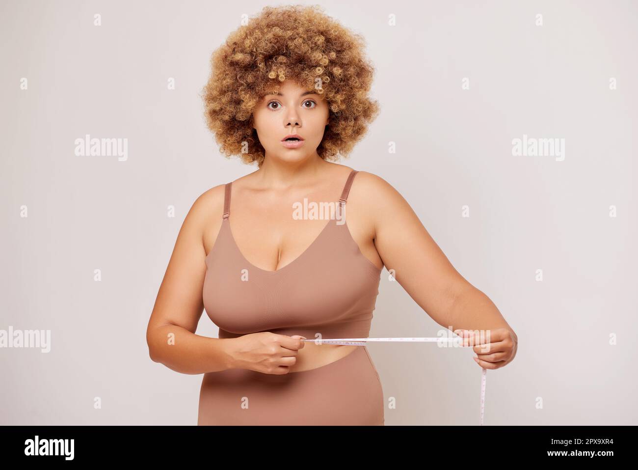 Woman's curvy waist Stock Photo - Alamy