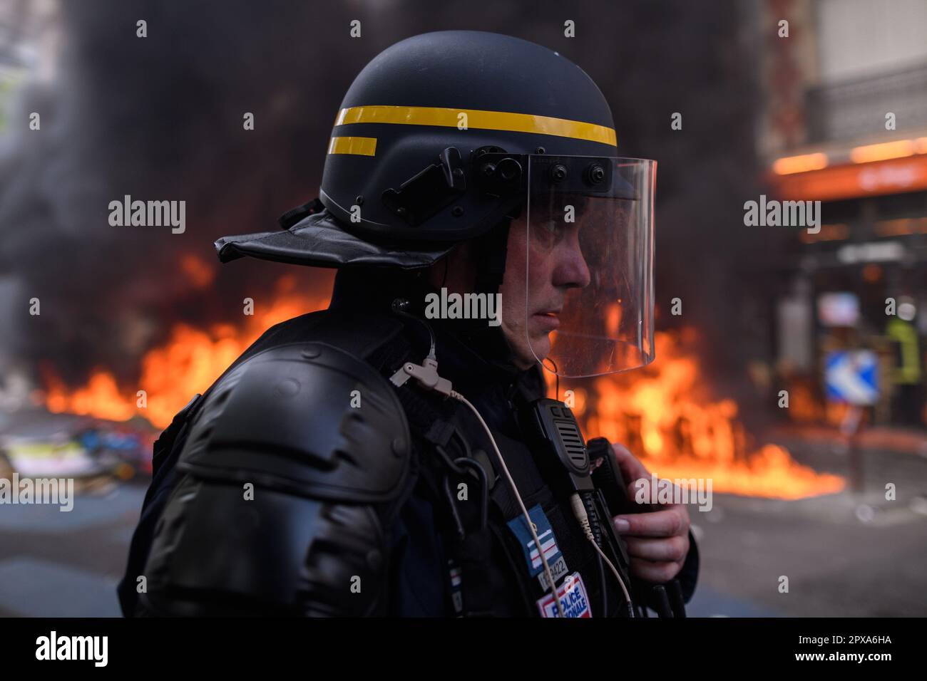 Paris, France. 1st May, 2023. A burning building on the Place de la Nation during the May Day 2023 demonstration in Paris. Credit: LE PICTORIUM/Alamy Live News Stock Photo