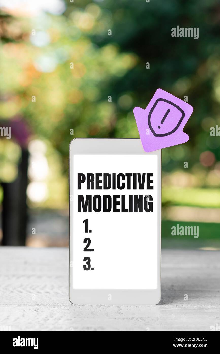 Handwriting text Predictive Modeling, Word Written on maintenance strategy driven by predictive analytics Stock Photo