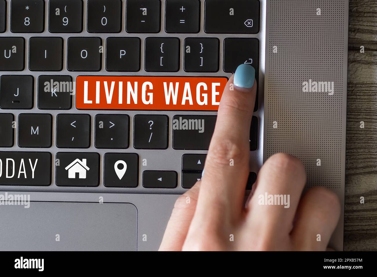 Sign displaying Living Wage, Business idea wage that is high enough to maintain a normal standard of living Stock Photo