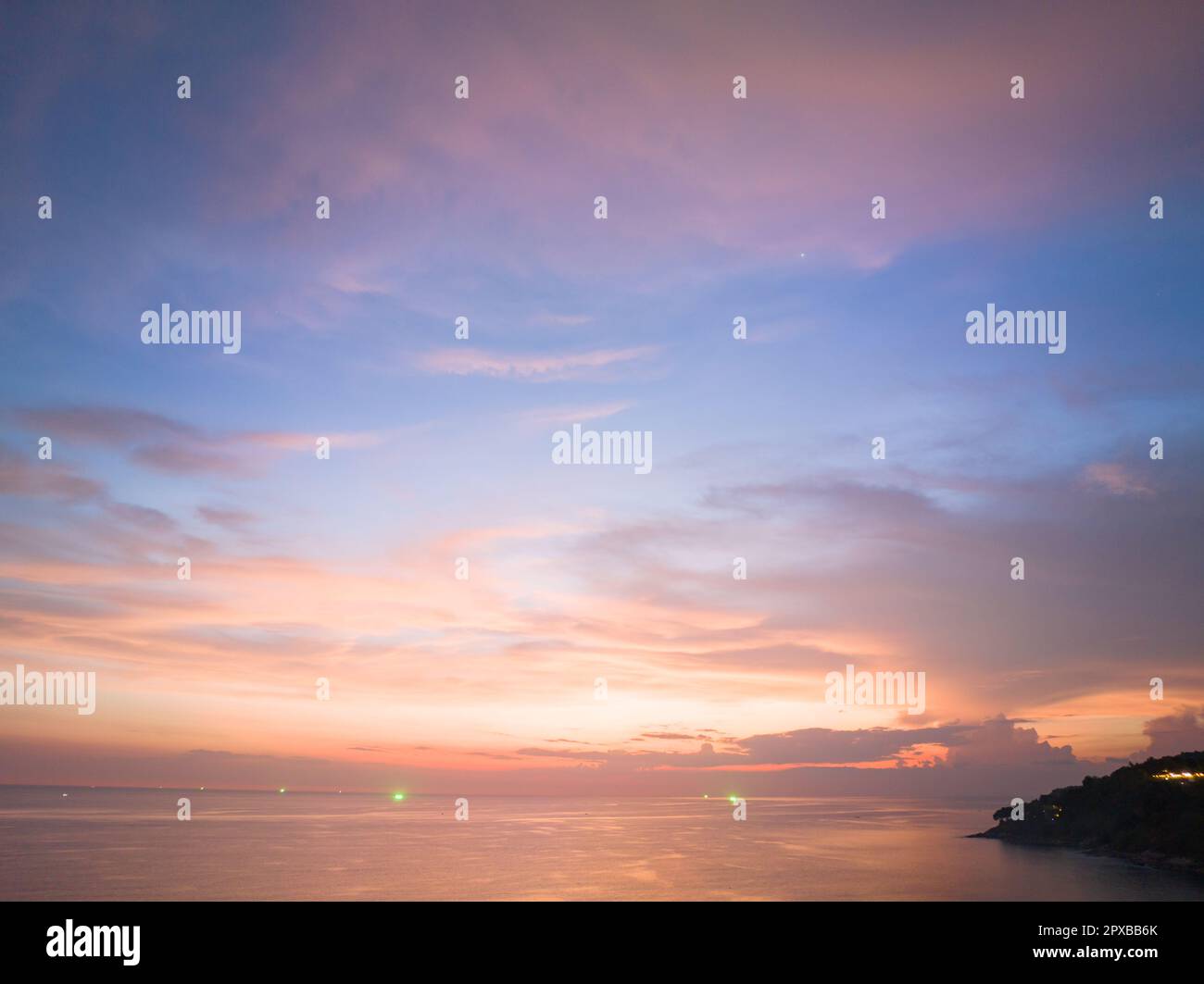 aerial view amazing sky in sunset above the ocean at Karon beach Phuket ...