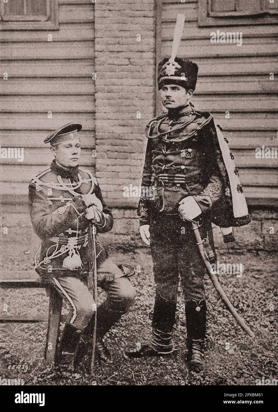 Imperial Russian Army. Guards Cavalry Left: Grodno Hussar Life Guards Regiment (Warsaw). Right: His Majesty's Hussar Life Guards Regiment (Tsarskoie Selo). Stock Photo